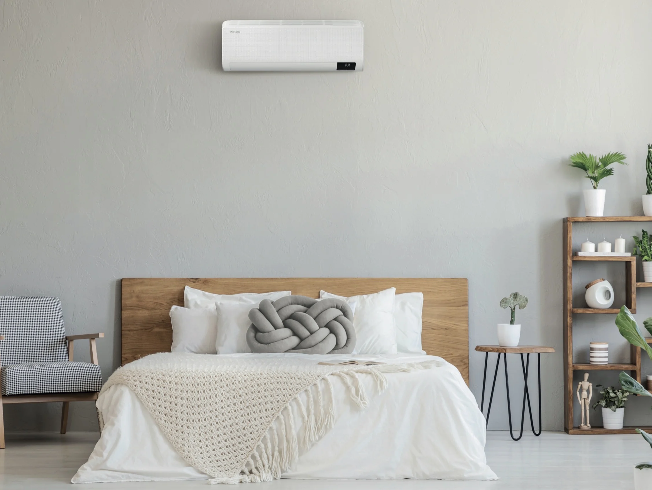 Wall-mounted air conditioning installed in a modern bedroom